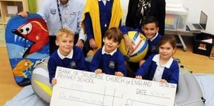 Pupils buoyant after RNLI cheque handover