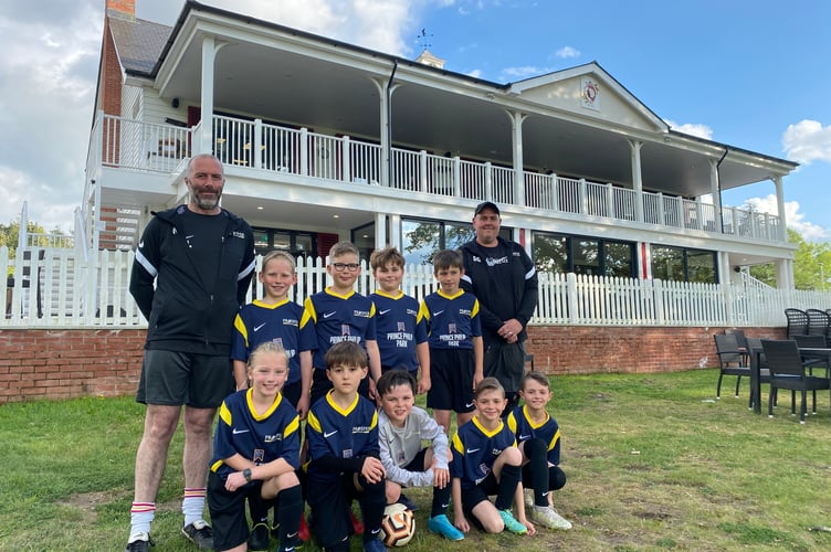 Prosper Raiders FC under-ten team for 2022-23 pictured outside the BOSC pavilion in Bordon.