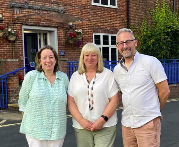 From left: Chair of trustees Lorna Vickery, retiring governor Jacky Wilde and headteacher Steve Mann at Amery Hill School in Alton, July 2022.