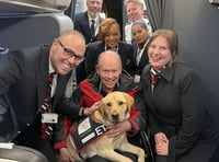 One man and his dog visit Northern Ireland school