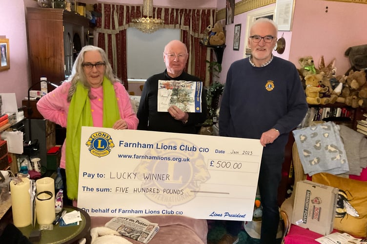 This lucky couple scooped the £500 star prize – but only after finding their missing Lions' Charity Advent Calendar down the back of their sofa!