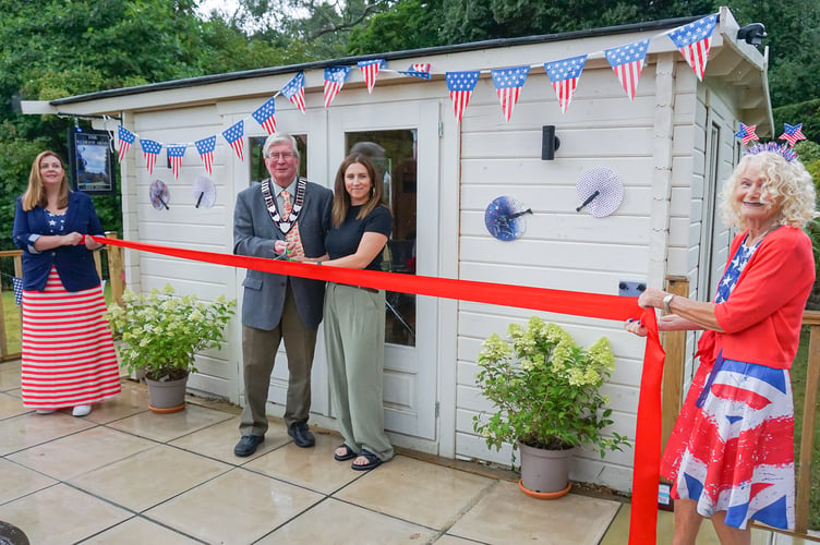 Town mayor Jerome Davidson and Sophie Liard opening The Redcot Arms