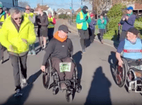 Farnham teen completes 10km in a wheelchair alongside Paralympian hero