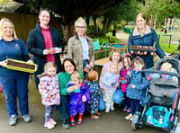 Community gardeners grow flowers and produce together in Alton 