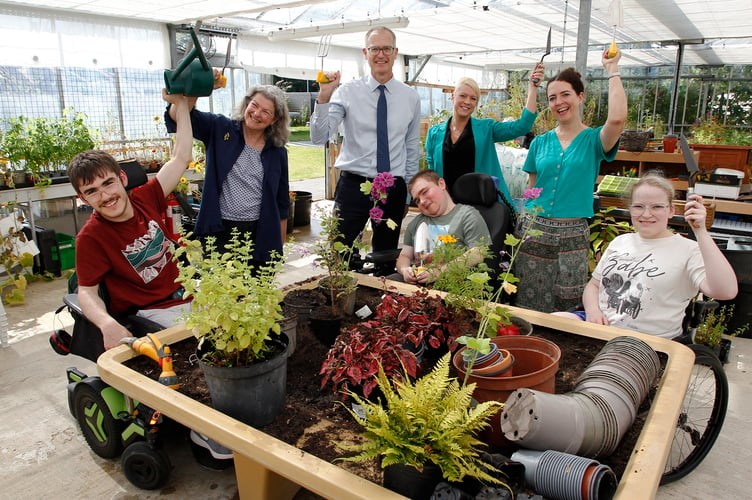 Miller Homes Southern donate money towards new greenhouse equipment at Treloar School and College, Alton. Pictures Louise Bellaers