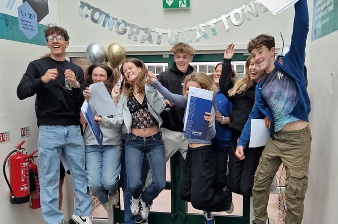 Students celebrate the results of their hard work 