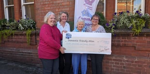 Charity gets hefty present from birthday girl and quizzers