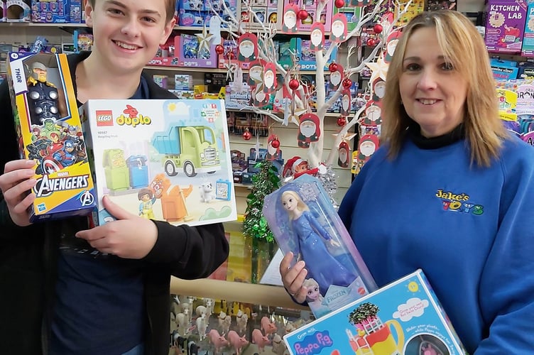 Joe Tully with his mum Julie at Jakes Toys, the shop is a long time supporter of the appeal