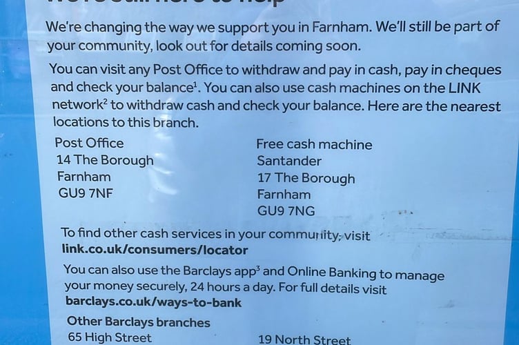 A poster in the window of Barclays Bank in Farnham announcing the branch's closure.