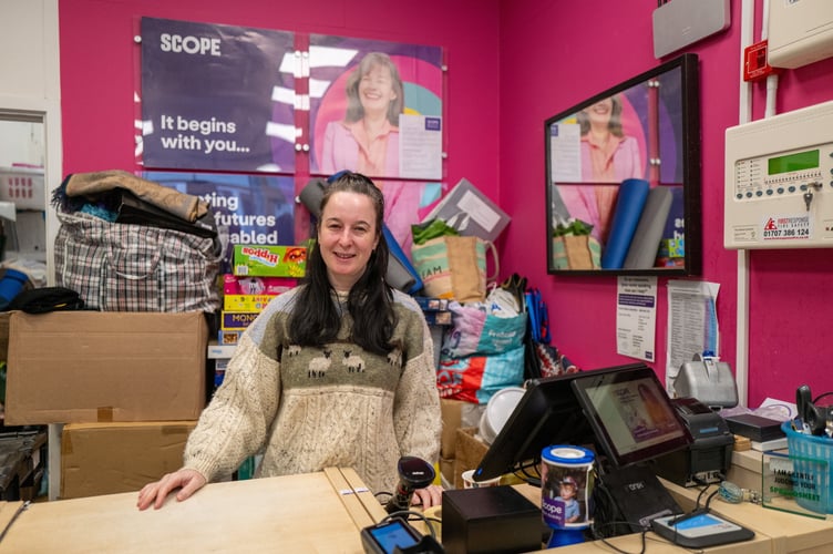 Imogen Cox who works at Scope charity shop Haslemere, that has seen a raise in shop lifting and shop thefts, Haslemere, Surrey, 23rd January 2025 . Photo released January 27 2025. Fed up business owners in a market town have launched a vigilante WhatsApp group - after a rise in "well-off middle-aged" shoplifters. Traders in Haslemere, Surrey say shoplifting has gotten so bad in recent months that messages are sent in the messaging group "every single day". Shop owners let each other know if they have been stolen from and share CCTV footage of criminals to look out for - with members aware of a few repeat perpetrators. They say the problem has been exacerbated by a "lack of police presence" in the town and insist that it is not linked to the cost of living crisis. 
