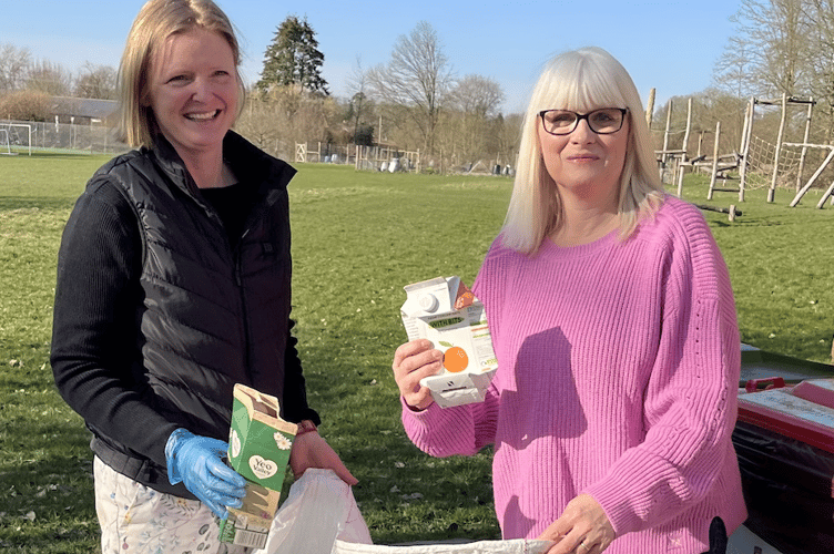 Karen Hawtin and Emily with Tetra Pak cartons, Selborne, March 2025.