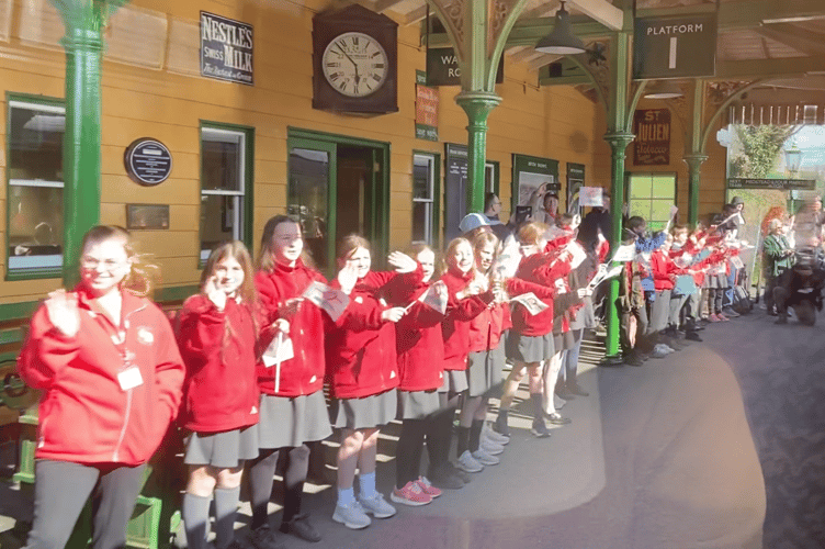 Flag-waving children, Ropley station, March 19th 2025.